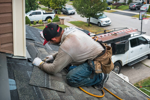 Professional Roofing technician working in New Richland, MN